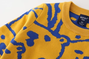Close-up of a ribbed crew neck on a blue and yellow knit sweater with size tag