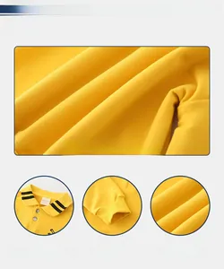 Detail view of ginger yellow cotton sweatshirt featuring polo collar and ribbed cuffs
