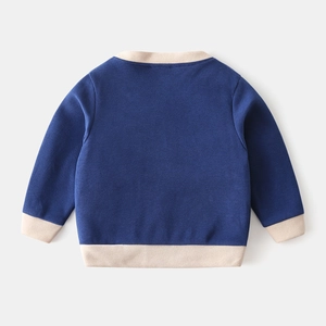 Classic deep blue baby cardigan featuring beige ribbed knit contrast trim on the back view