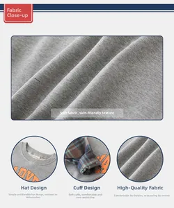 Macro detail of kids grey sweatshirt featuring check cuff inserts and soft cotton texture