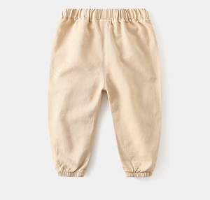 Détails du pantalon de jogging pour enfant avec taille élastique et chevilles côtelées