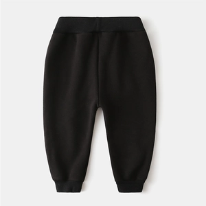 Thick black joggers for boys with elastic waistband and ribbed cuffs for autumn winter