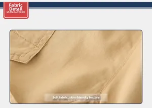Detailed macro shot of beige twill cotton fabric showing high-quality stitching and texture