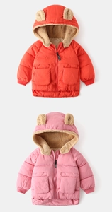 Detail of hooded kids jacket featuring 3D bear ears and warm brown sherpa lining