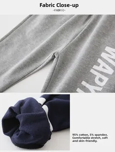 Gros plan du tissu gris en coton éponge pour pantalon d'enfant avec détails de la texture