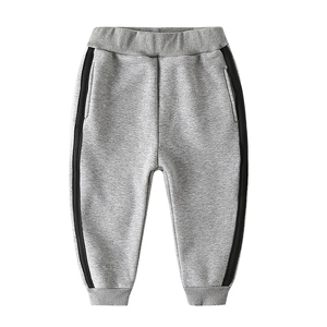 Thick fleece-lined gray jogger pants for boys with side stripes and elastic waist