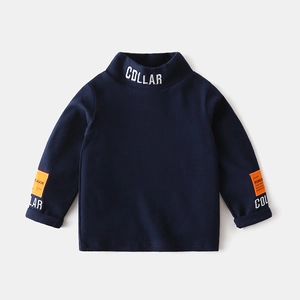 Navy blue boys long sleeve turtleneck shirt with cotton knit and orange patch