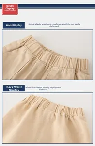 Détail de la taille élastique d'un pantalon enfant en sergé de coton kaki, coutures précises