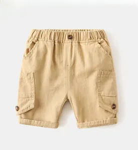 Detail of khaki cargo shorts with elastic waist and large functional side pockets