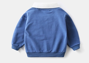 Back view of medium blue kids' long-sleeve sweatshirt with white polo collar detail