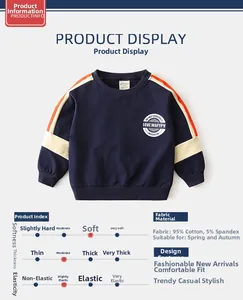 Detail of navy boy's sweatshirt fabric specs with orange sleeve stripes and cotton blend info