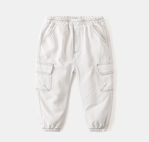 Detail of boys cargo pants featuring contrast black stitching and elastic waist
