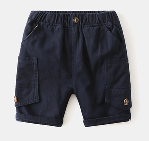 Detail of dark blue cargo shorts with elastic waistband and large buttoned pockets