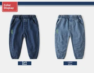 Flat lay of boys denim jeans in dark and light blue with elastic waist and pocket details