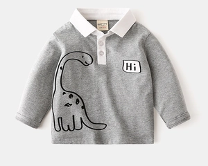 Detail of grey striped kids polo shirt with cartoon dinosaur print and contrast collar