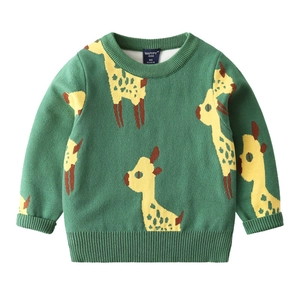 Green children knit sweater with yellow giraffe pattern and ribbed cuffs on white background