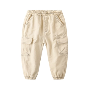 Flat lay of off-white children cargo pants with elastic waist and flap pockets