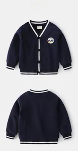 Detail of dark blue V-neck toddler cardigan featuring car embroidery and striped trim