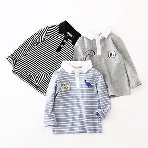Three-pack kids long sleeve cotton polo shirts with stripes and dinosaur prints