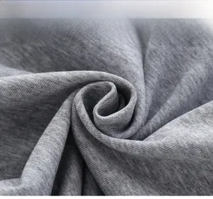 Dettaglio del tessuto in cotone grigio che mostra la morbida maglia della felpa bimbo