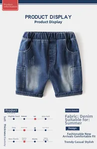 Detail view of boys denim shorts with elastic drawstring waist and side cargo pockets