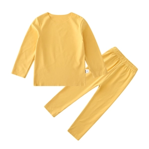 Ensemble de sous-vêtements thermiques enfant jaune gingembre avec haut et pantalon