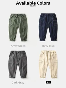 Detail view of four cotton cargo pants for boys in army green, navy blue, grey and beige
