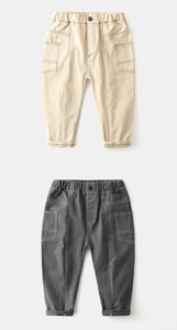 Detailed view of elastic waist and contrast stitching on boys' cotton cargo pants