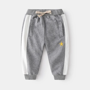 Grey boys' cotton sports pants with side stripes and yellow star embroidery