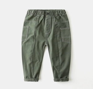 Detail of boys olive cargo pants showing elastic waist and white contrast stitching