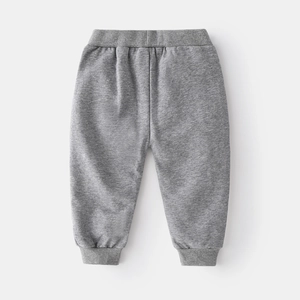 Flat lay of boys gray cotton jogger pants with elastic waistband and ribbed cuffs