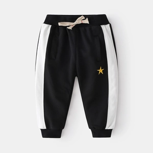 Boys black jogger pants with white side stripes and yellow star embroidery detail