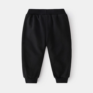 Classic black boys sports trousers with elastic waist and ribbed cuffs for kids casual wear