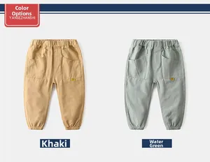 Detail of khaki and aqua green boys casual cotton pants with elastic waist and pockets