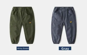 Detail of kids cotton joggers featuring elastic waistband and large side pockets