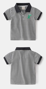 Close-up of boys' striped polo shirt with green dinosaur embroidery and ribbed collar