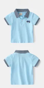 Detailed front and back view of light blue kids polo shirt with car embroidery and navy stripes