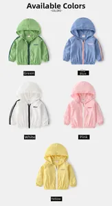 Flat lay of five hooded kids sun protection jackets in green, blue, white, pink and yellow