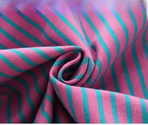 Close-up of purple and green striped knit fabric showing soft texture and quality