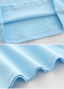 Close-up of light blue polo shirt featuring pique knit texture and double-needle hem