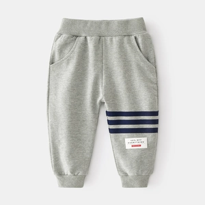 Casual grey kids jogger pants with blue side stripes and elastic waist for boys