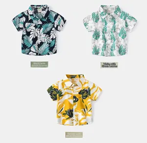 Detailed comparison of three boys' Hawaiian shirts with tropical floral patterns and buttons