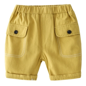 Kids yellow cotton cargo shorts with elastic waist and large side flap pockets for summer