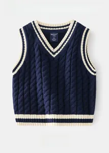 Detail of navy knit V-neck vest for boys with classic cable pattern and striped edges