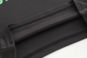 Detail of breathable honeycomb mesh fabric and neat double-needle hem on sports t-shirt