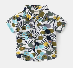 Detailed view of kids' short sleeve shirt featuring colorful floral prints and white buttons