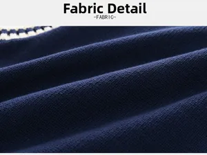 Macro shot of navy blue knit fabric showing tight stitching and thick texture