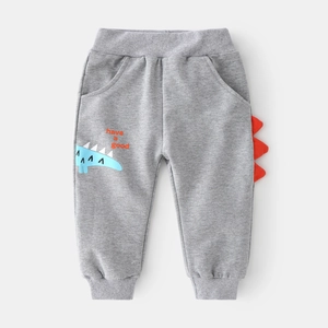 Pantaloni sportivi grigi per bambini con pinne 3D e stampa di dinosauro blu
