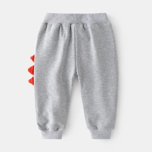 Pantaloni sportivi grigi per bambini con pinne di dinosauro 3D rosse e polsini elastici