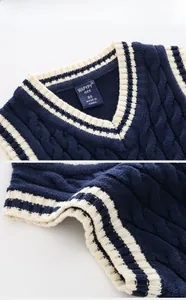 Detailed knit texture and V-neckline of this navy blue school style boy sweater vest